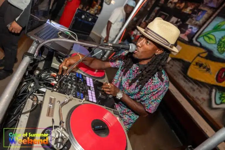 Man DJing at an event for Face614